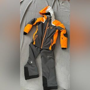 Brand new Spyder brand snow pants and jacket. Youth boys Size 14.